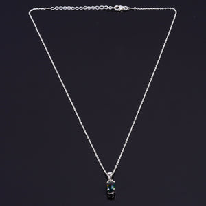 Rare jewelry design in a 13 Ct Black Ethiopian Opal Pendant