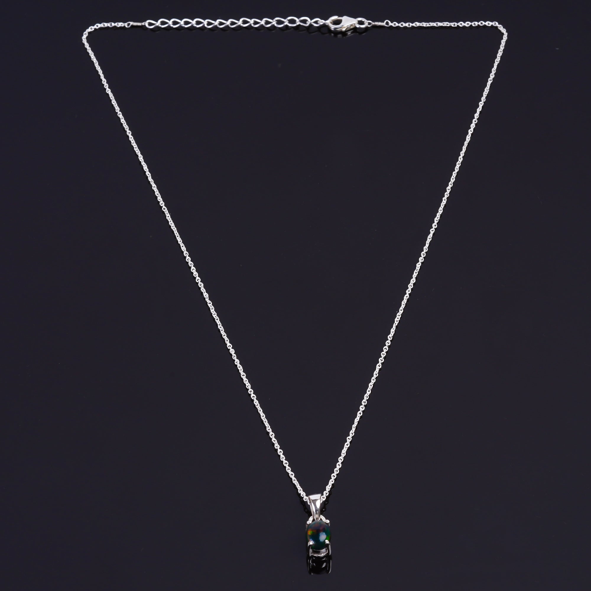 Rare jewelry design in a 13 Ct Black Ethiopian Opal Pendant