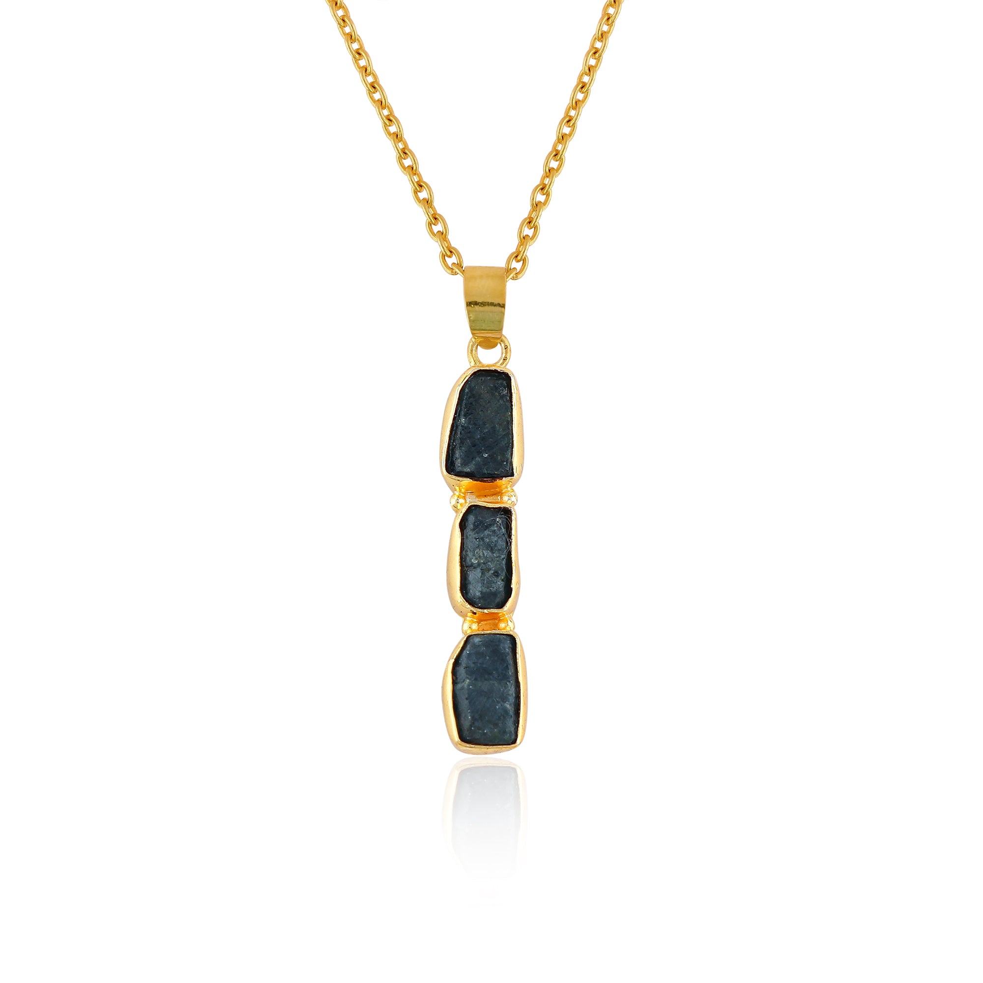 Natural sapphire raw crystal pendant necklaces displayed in a row with irregular blue gemstones set in gold-plated bezels on 18-inch chains