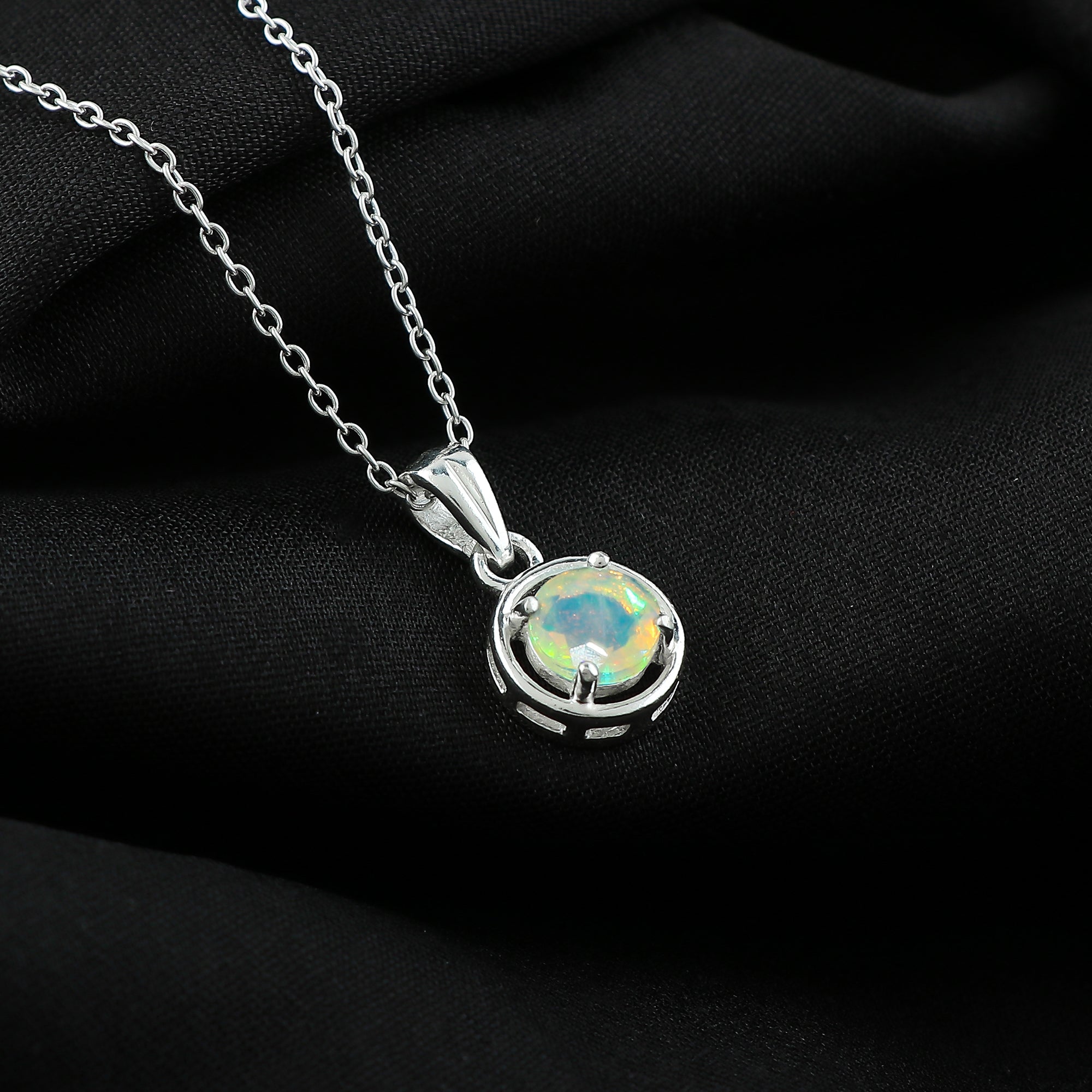 Elegant Pendant handcrafted in 925 silver with 0.5 Ct Ethiopian Opal Stones