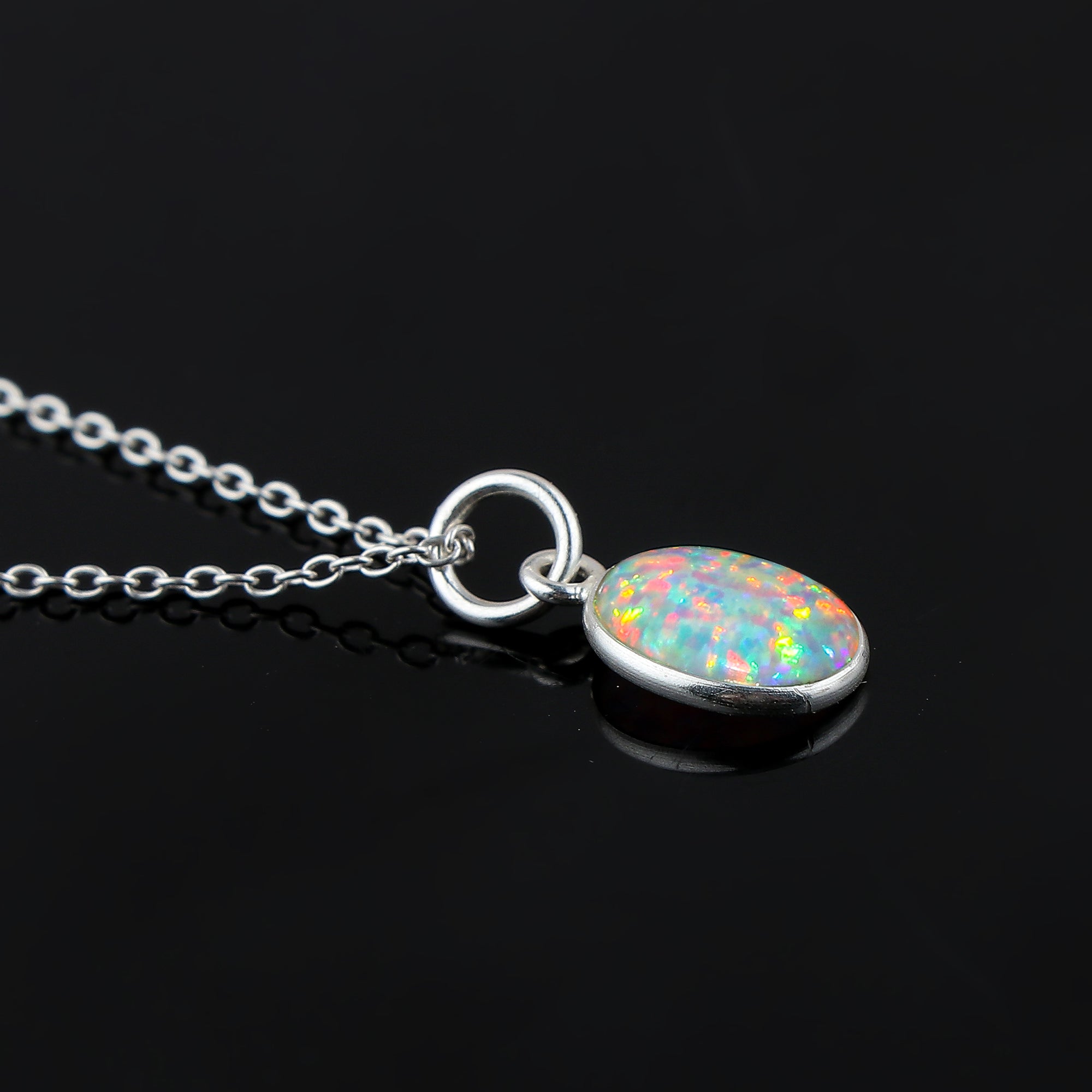 Elevating Gemstones in a 1.3 Ct Ethiopian Opal Pendant