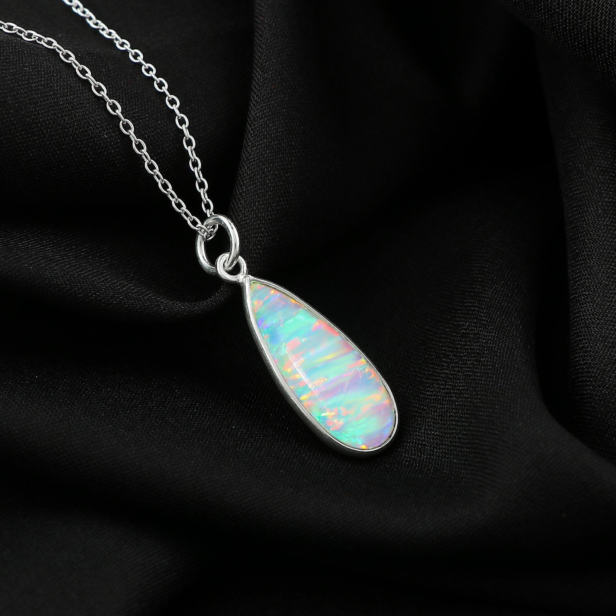Elegant designs in 1.3 Ct White Line Ethiopian Opal Pendant mounted on 925 silver