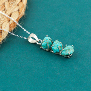 Expand your jewelry collection with this dazzling Natural Turquoise Raw Gemstone Pendant Necklace