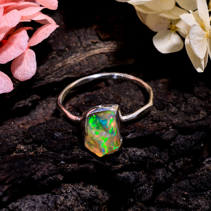 Handcrafted sterling silver ring featuring natural white Ethiopian opal