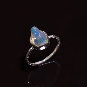 Exquisite artisan-made silver ring featuring a luminous Raw white Ethiopian opal