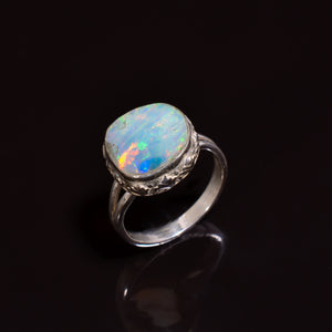 Artisan handcrafted 925 sterling silver ring showcasing a 12×12 mm Raw White Ethiopian opal