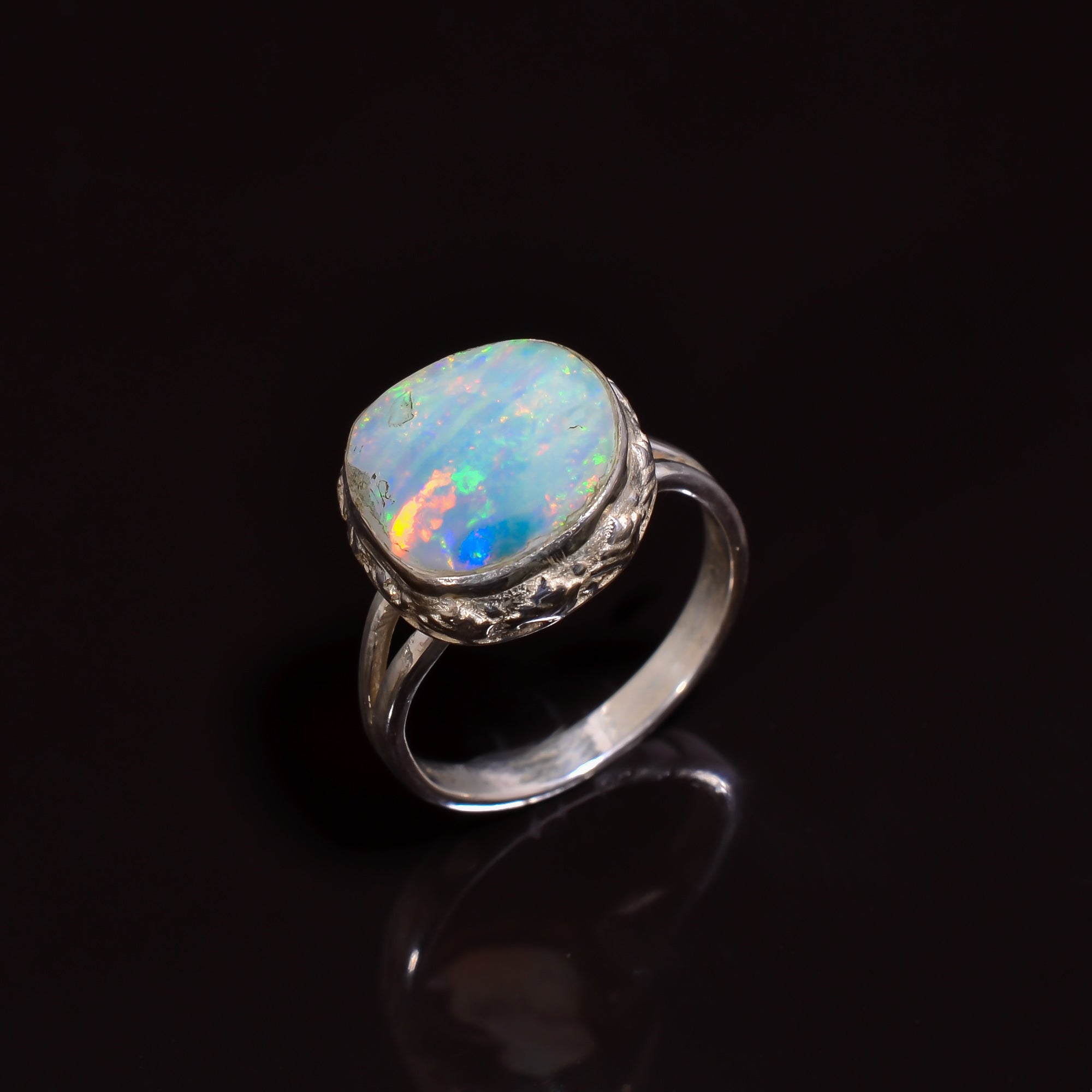 Artisan handcrafted 925 sterling silver ring showcasing a 12×12 mm Raw White Ethiopian opal