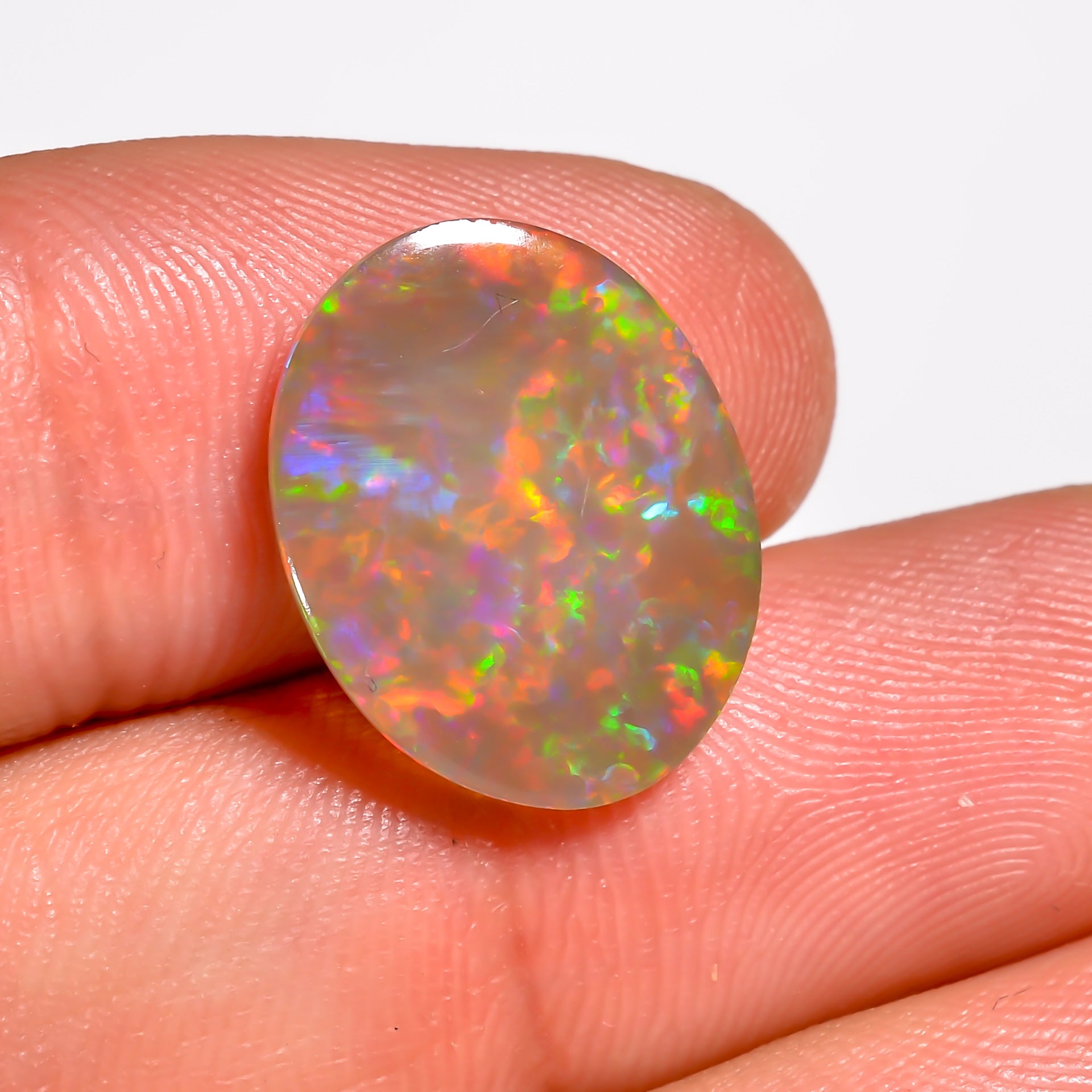 Rare Brown Ethiopian Opal cabochon with natural inclusions 

