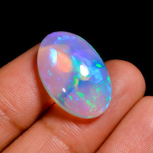 White Ethiopian Opal Cabochon Gemstone with multi-colour fire 
