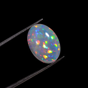 Stunning 6.00 white Ethiopian opal gemstone with a unique color change effect.
