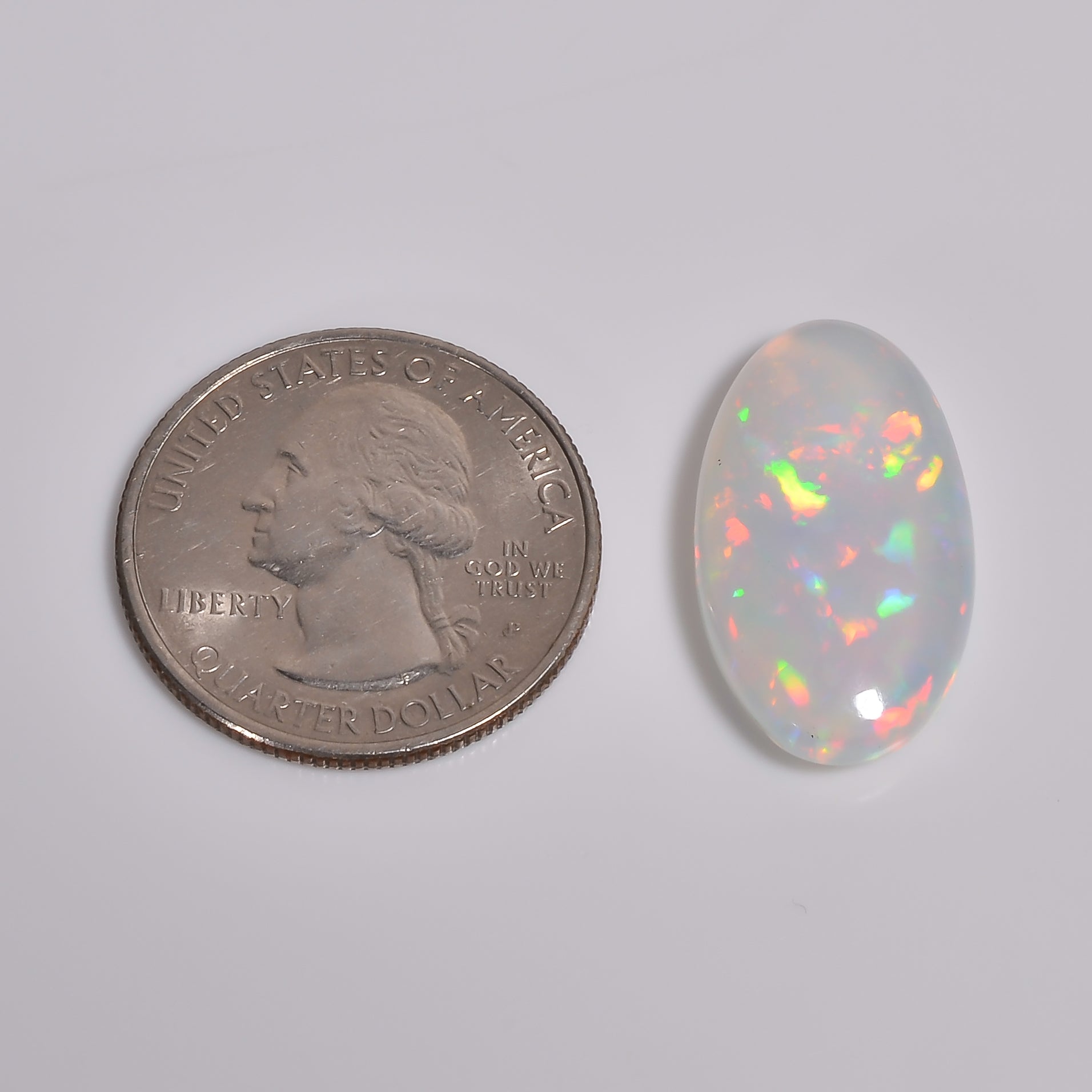 10.00 carat white Ethiopian opal gemstone with vivid play-of-color, AAA quality

