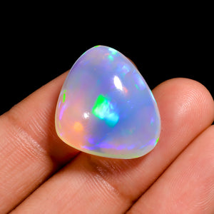 Natural White Ethiopian Opal gem in a heart-shaped, loose stone with fiery sparkle
