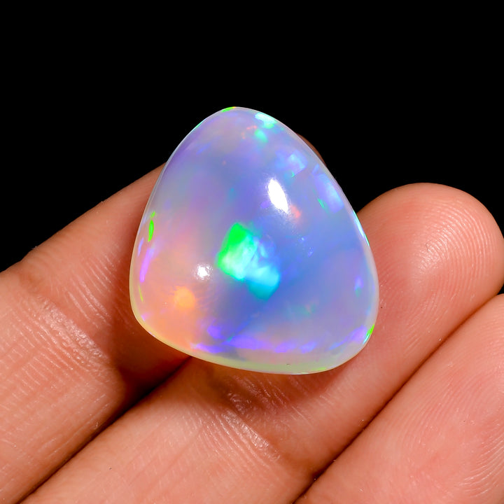 Natural White Ethiopian Opal gem in a heart-shaped, loose stone with fiery sparkle
