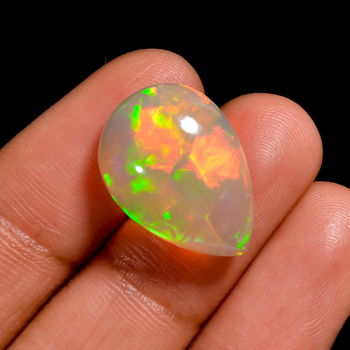 Stunning 9.00 ct Ethiopian Opal cabochon with multi-Colorfire, pear-shaped gemstone 
