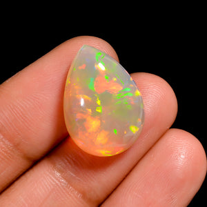 Loose Ethiopian Opal 9 ct white, pear cabochon cut with bright play of color
