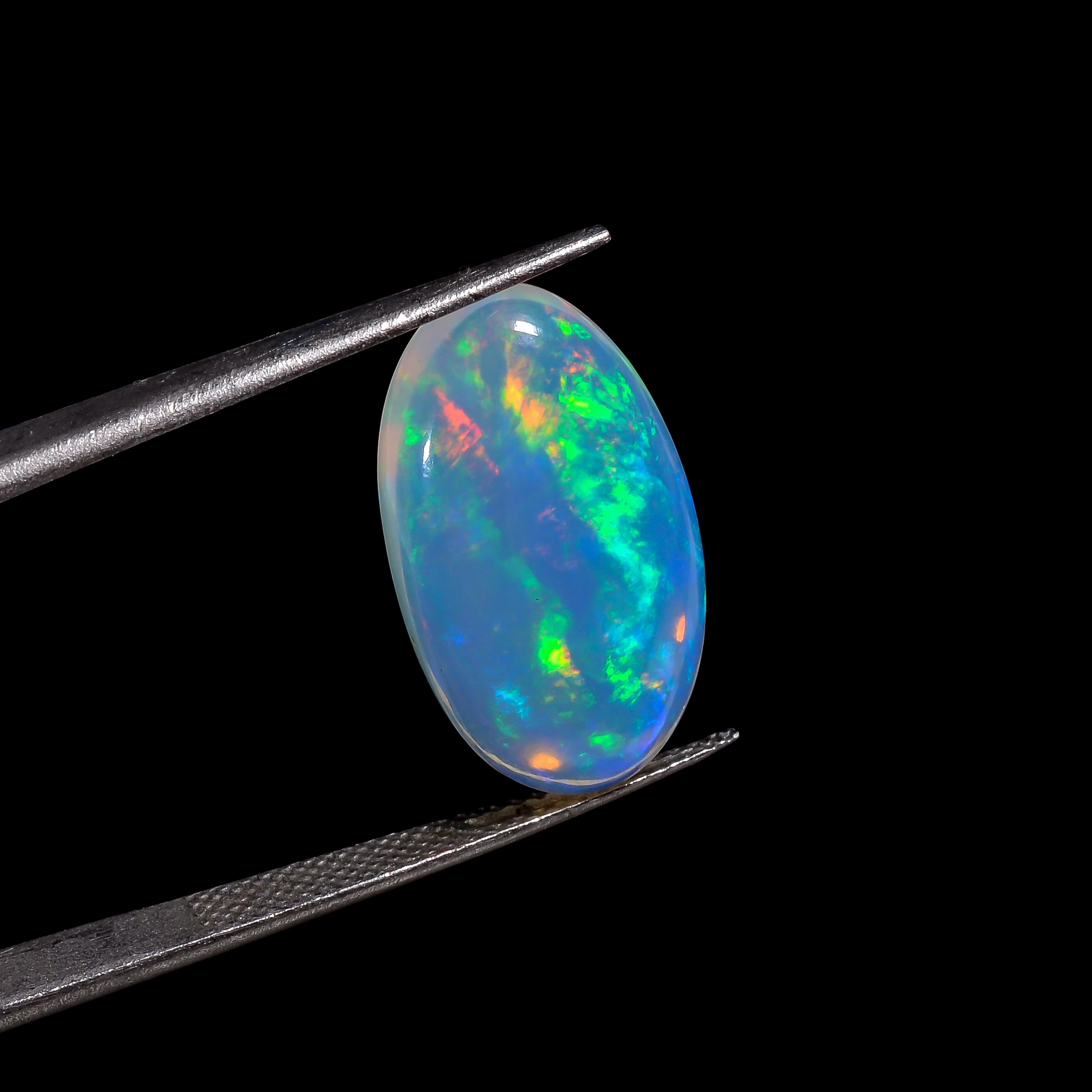 High-quality 06.50 carat White Ethiopian Opal displaying vivid fire play and clarity 
