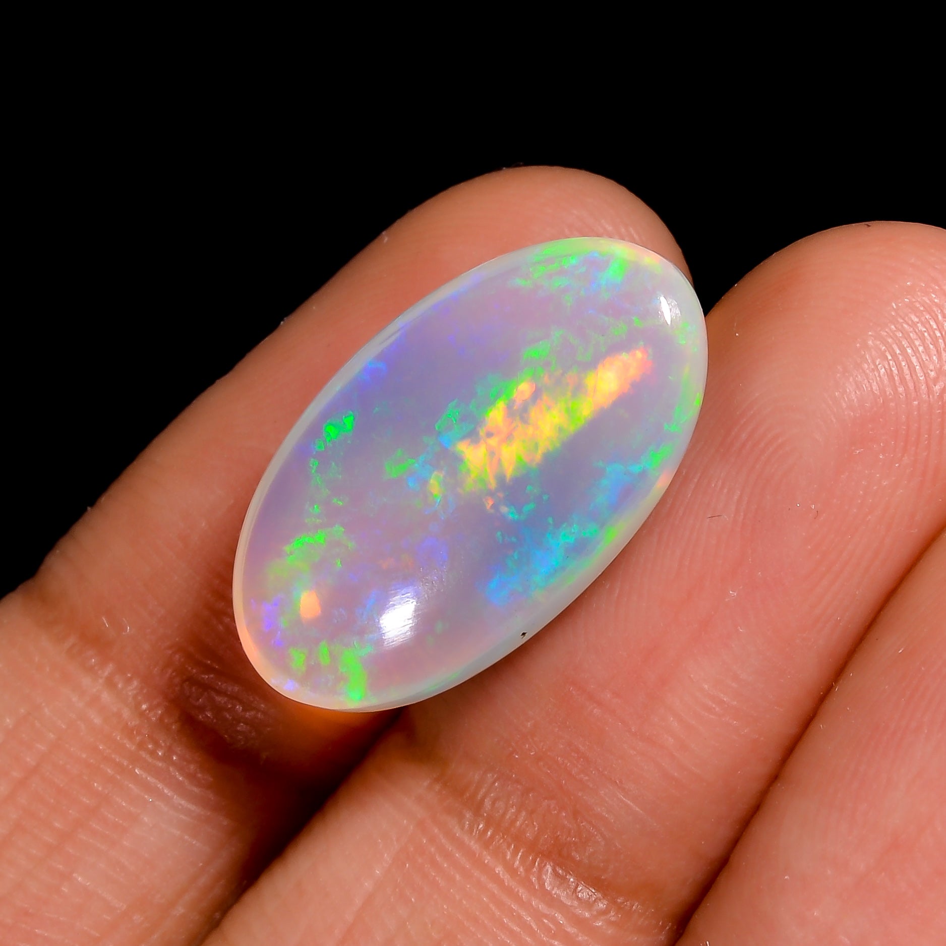 Elegant 06.50 Oval-shaped White Ethiopian Opal Loose cabochon with colourful light reflection  
